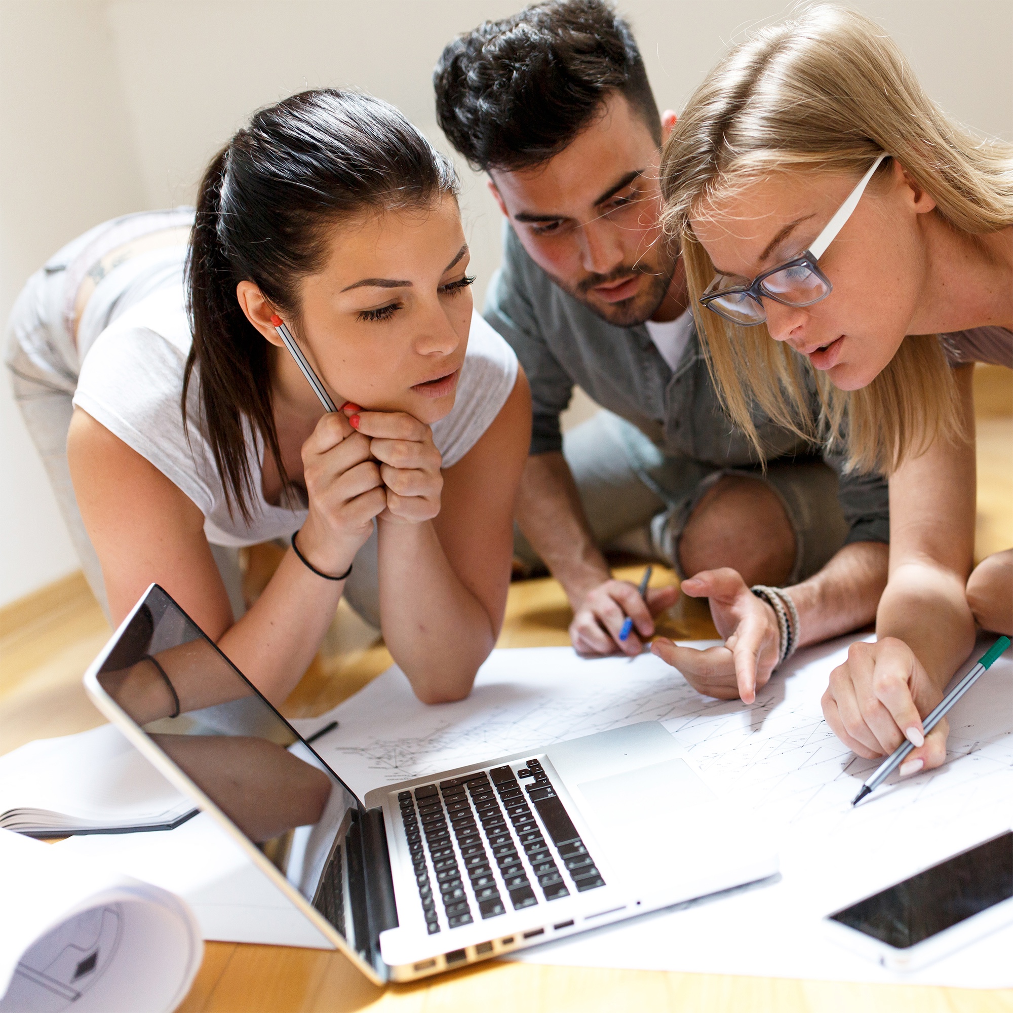 Small wooden pier in Cala d'Hort bay and view of Es Vedra island